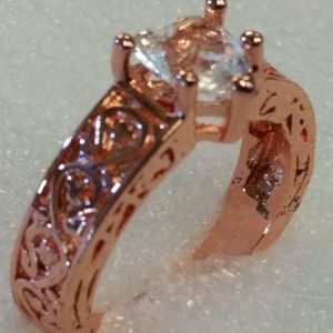 Rose gold filled 18K with white sapphire center